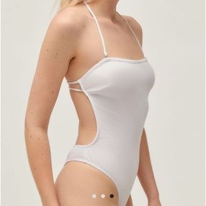 Never worn: Out from under open-back body suit